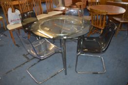 Glass Topped Chrome Framed Table with Four Perspex Chairs