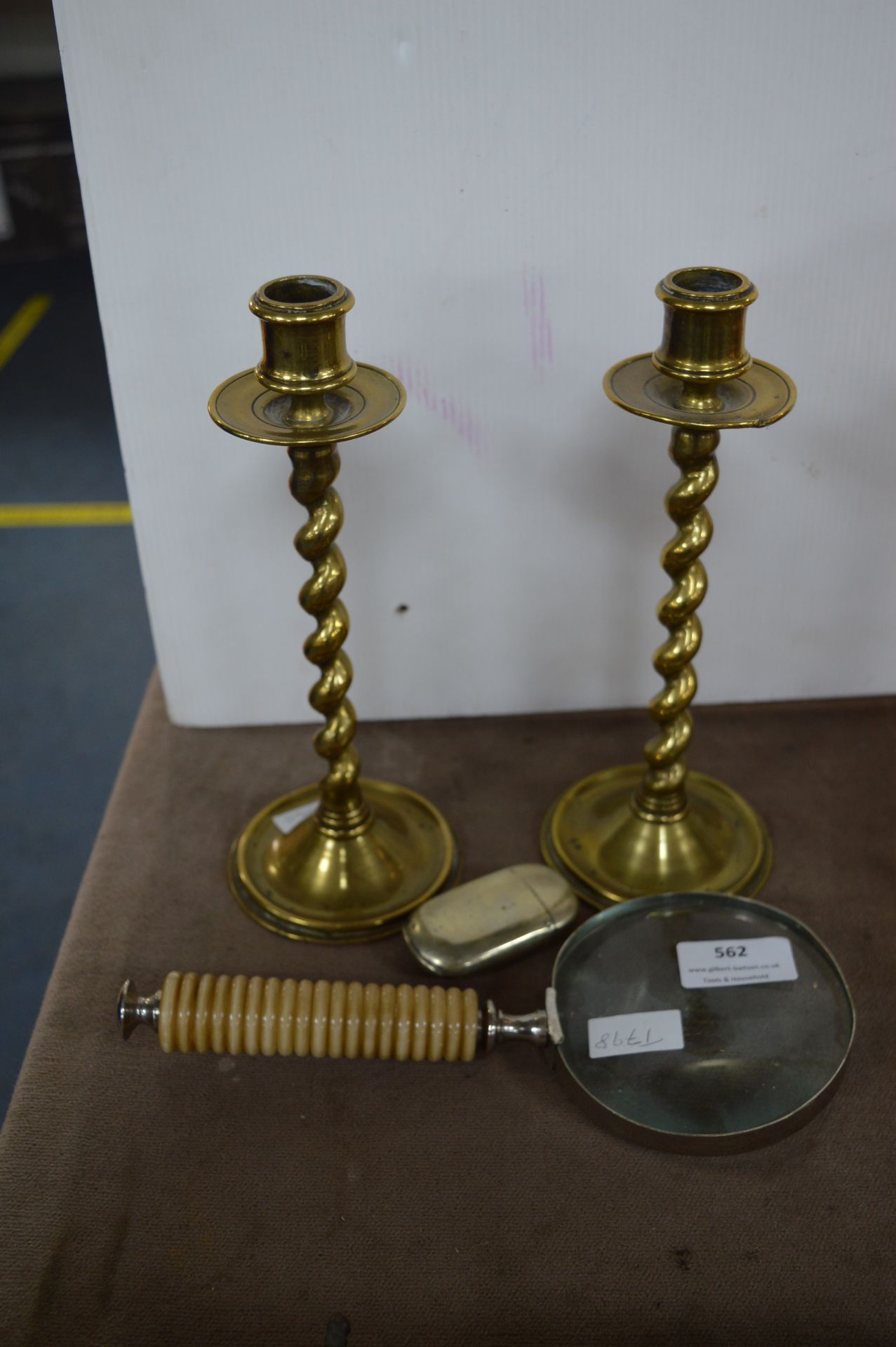 Pair of Brass Candlesticks, Vesta Case and Magnifying Glass