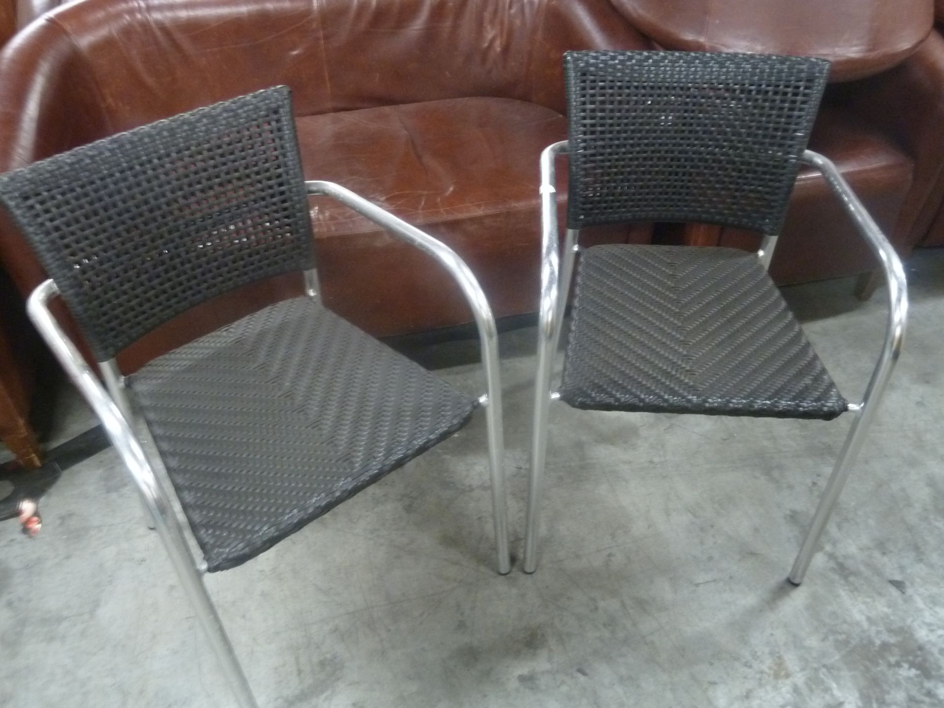 *chrome and black wicker chairs x 8