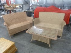 *wicker table with 2 sofas