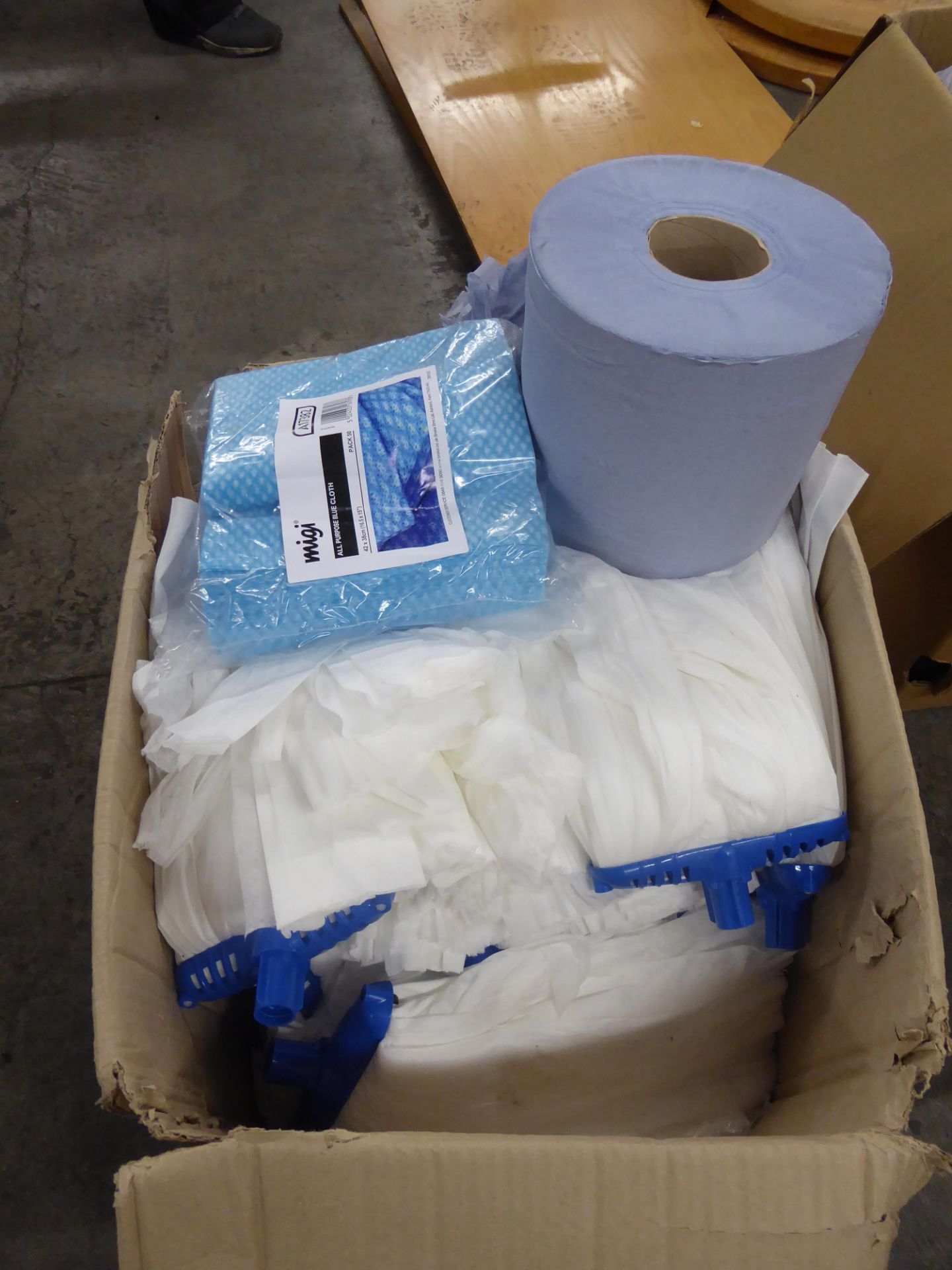 *large quantity of mop heads, blue room and blue cloths