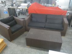 *rattatan set - including sofa, chair and table with black seat, back and bolster cushions