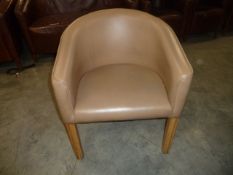 *tan faux leather tub chairs x 2