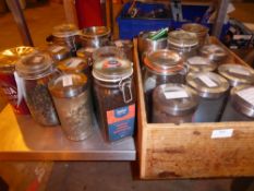 *selection of loose leaf teas in wooden crate with storage jars