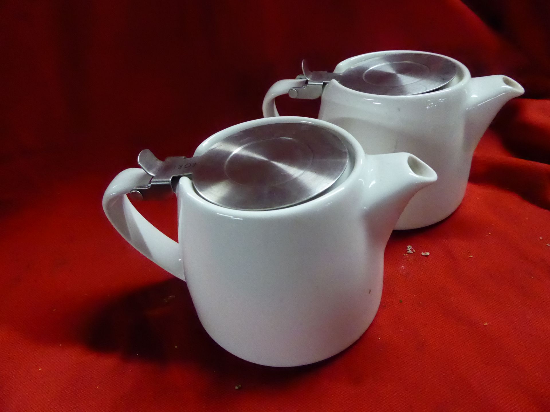 *white porcelain teapots x 16