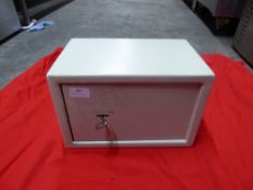 *small white safe with key