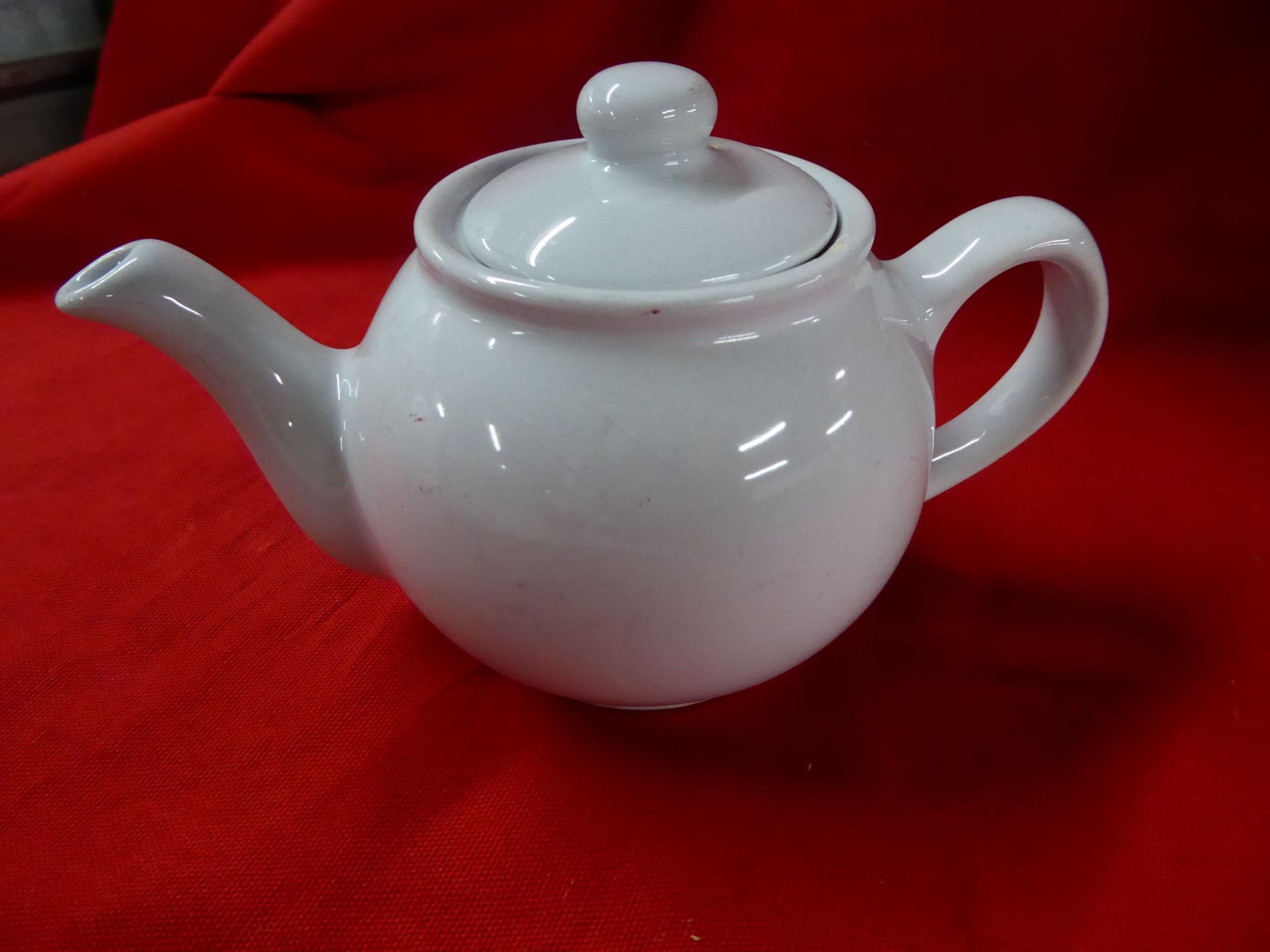 *white teapots x 9