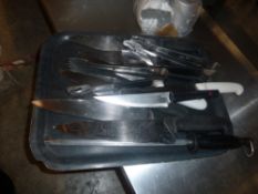 *selection of knives with sharpener and tongs