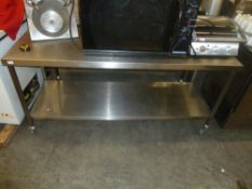 *S/S prep bench on castors with under shelf 1800w x 650d x 860h