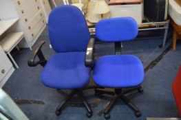 Two Blue Office Swivel Chairs