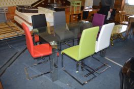 Glass Topped Dining Table with Mirrored Legs and Six Coloured Dining Chairs