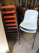 Six Metal Framed Stacking Stools and Two Chairs