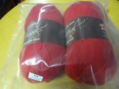 Two Large Rolls of Red Wool