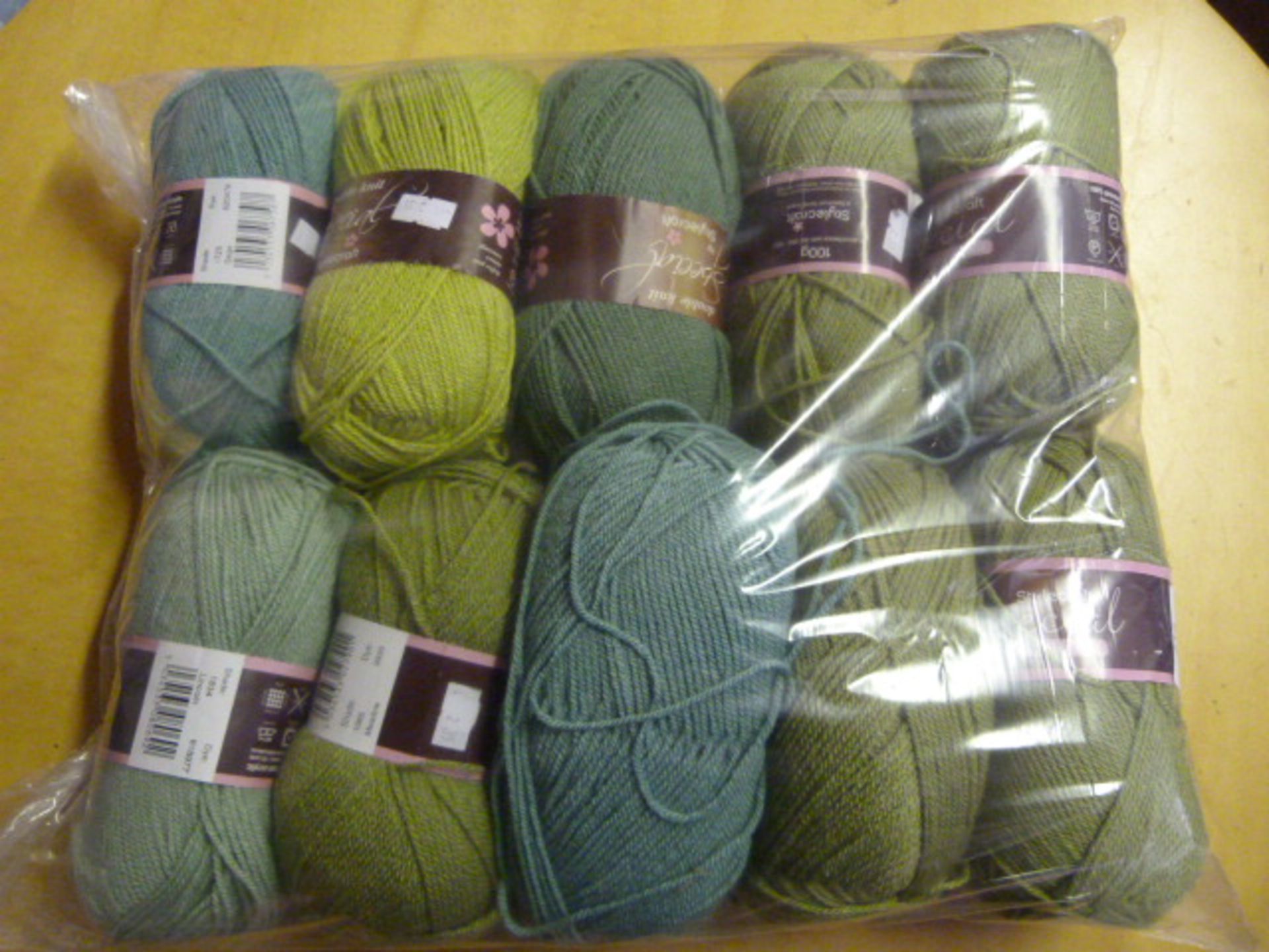 Ten Rolls of Dark Green Wool