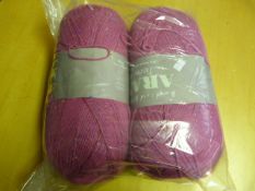 Two Large Rolls of Mixed Pink Wool