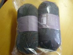 Two Large Rolls of Green Wool