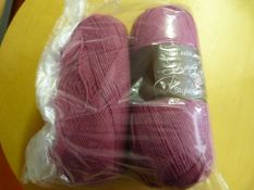 Two Large Rolls of Pink Wool