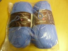Two Large Rolls of Light Blue Wool