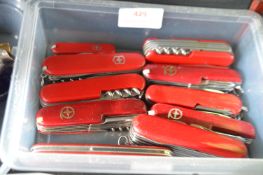 Ten Swiss Army Knives