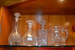 Three Cut Glass Crystal Decanters and a Jug