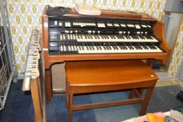 Hand Organ with Stool and Music Sheets