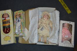 Four Boxed Dolls