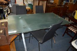 Glass Topped Dining Table and Three Chairs