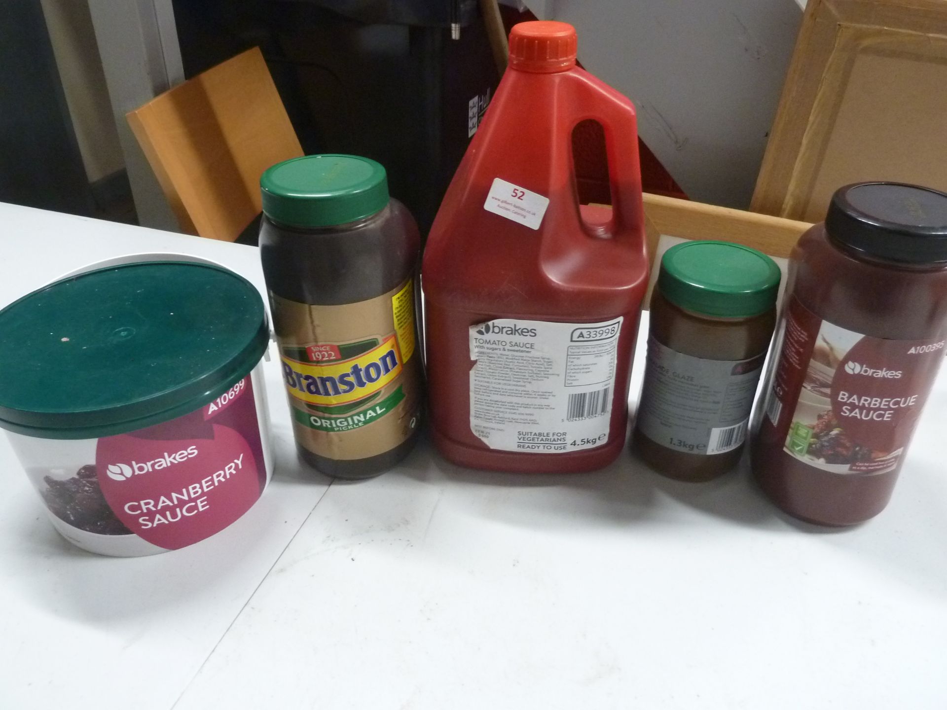 * selection of catering size sauces - tomato, BBQ, marmalade glaze, branston pickle