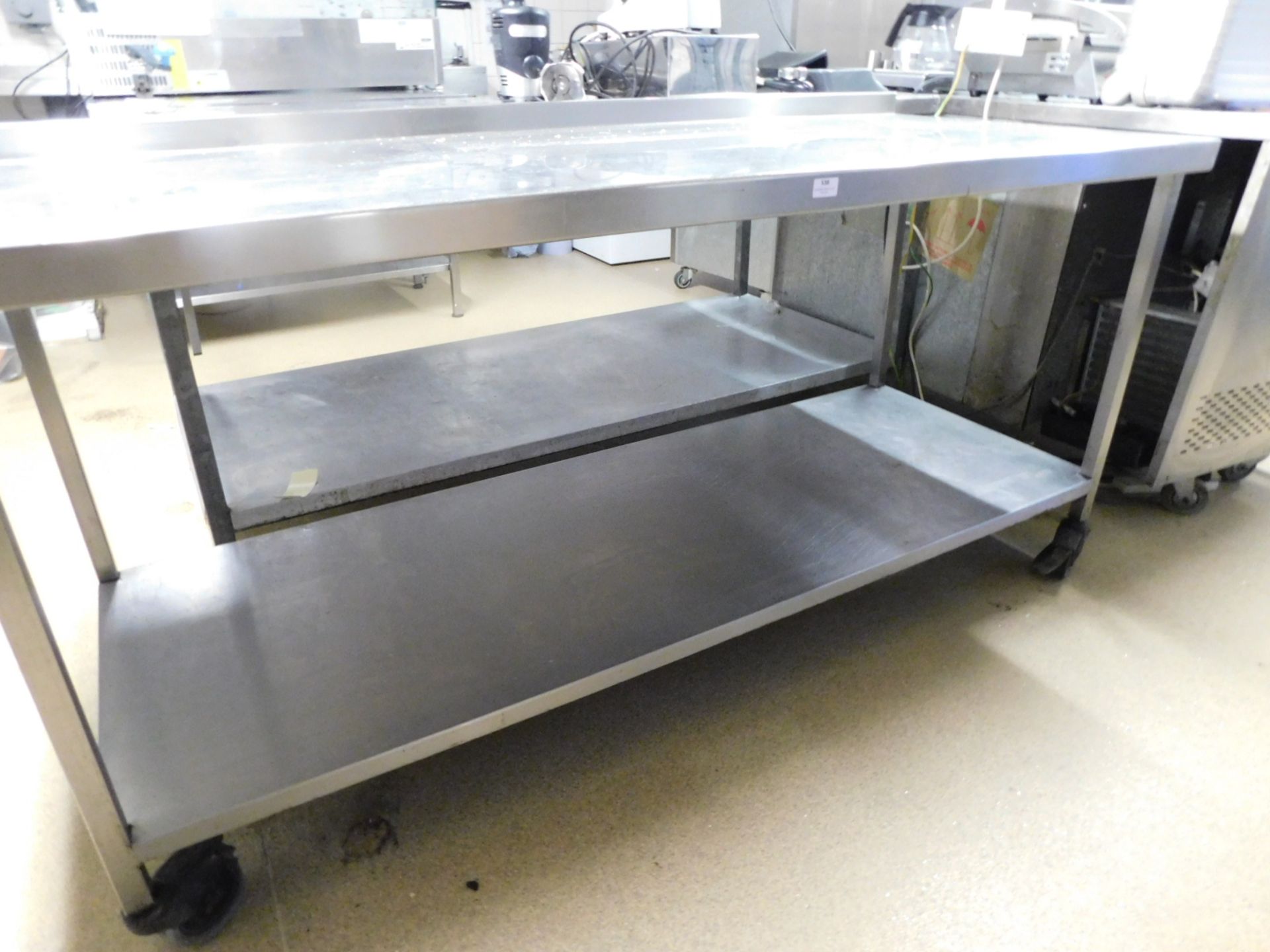 * S/S prep bench on castors with upstand and undershelf 1800w x 760d x 900h