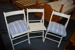 Three White Folding Chairs (Distressed Base)