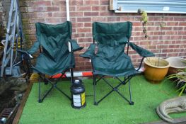 Two Folding Camping Chairs and a Lantern