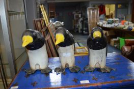 Three Wooden Penguins