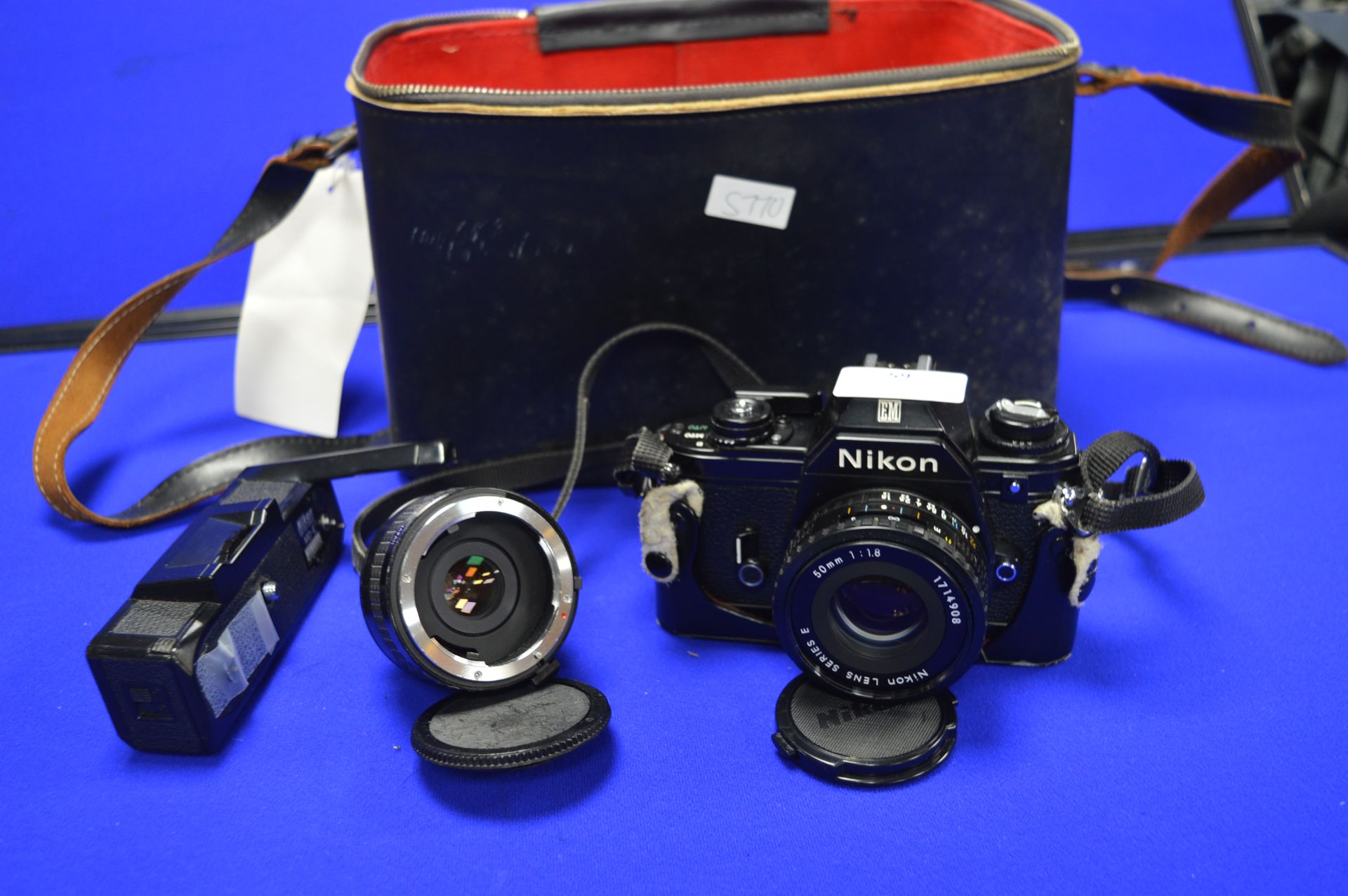 Nikon EM SLR Camera with Lens and Teleconverter etc.