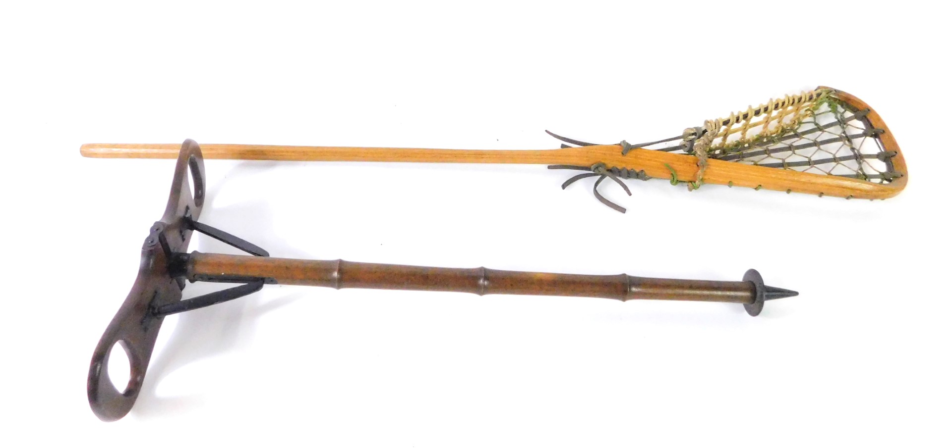 An early 20thC beech wood and black metal shooting stick, 88cm H, together with a vintage lacrosse