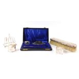 A George V silver and cut glass part manicure set, cased, comprising nail buffer, file and