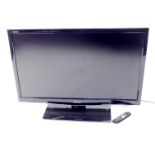 A Sharp 42" LCD colour television, Model LC-42X20E, with remote.