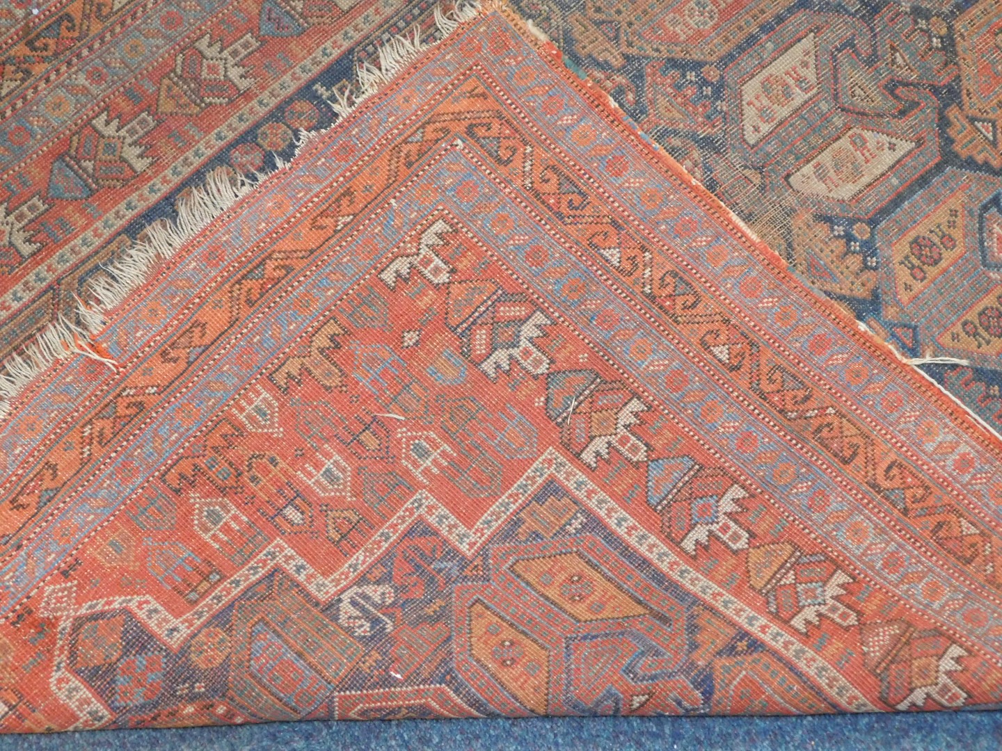 A Turkish design rug, with multi gul central field on a blue ground enclosed by a red border with - Image 3 of 3