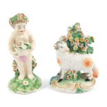 A late 18thC Derby porcelain figure of a Putto, modelled standing holding a basket of flowers,