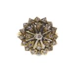 A 9ct gold and diamond flower head ring, in a basket setting, size M, 4.3g.