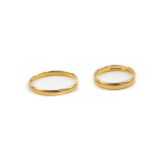 Two 22ct gold wedding bands, sizes R and K, 5.1g.