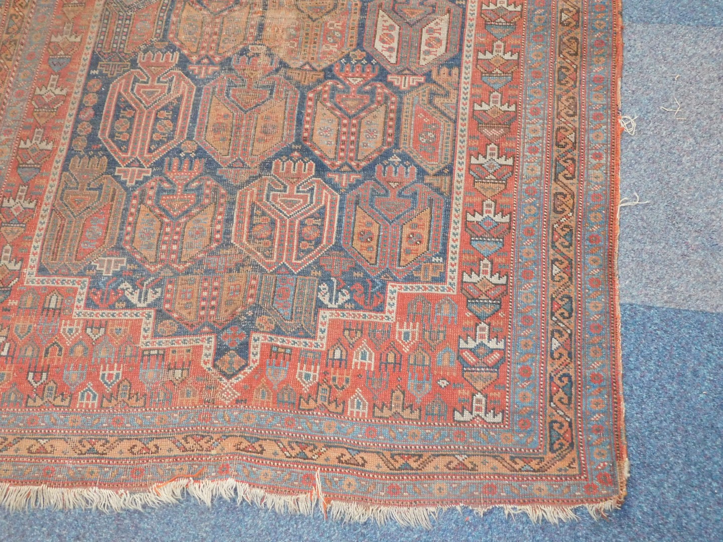 A Turkish design rug, with multi gul central field on a blue ground enclosed by a red border with - Image 2 of 3