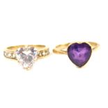A 9ct gold and amethyst heart shaped solitaire ring, size O, and a 9ct gold and cubic zirconia heart