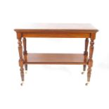A Victorian mahogany buffet, two tier with turned supports, brass capped on castors, 95cm H, 122cm
