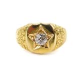 A Victorian gentleman's diamond set signet ring, with a rose cut diamond in a star setting, in a