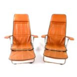 A pair of 1960's/70's folding chairs, with metal frames and tan leatherette seats and backs, with