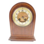 A late Victorian mahogany cased mantel clock, circular brass dial, with enamel chapter ring