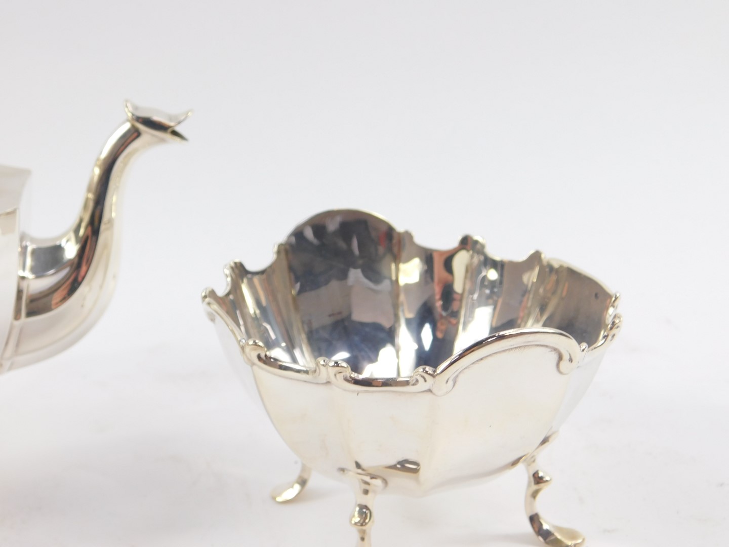 A George V silver three piece tea set, of fluted form, raised on four cabriole legs, comprising - Image 3 of 5