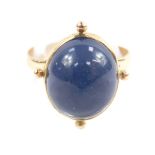 A 9ct gold and cabachon star sapphire ring, approx 10cts, size Q, 4.1g.