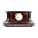 A French late 19thC slate and marble mantle clock, circular enamel dial bearing roman numerals,