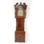 Kleiser of York. An early 19thC mahogany and rosewood longcase clock, the break arch enamel dial and